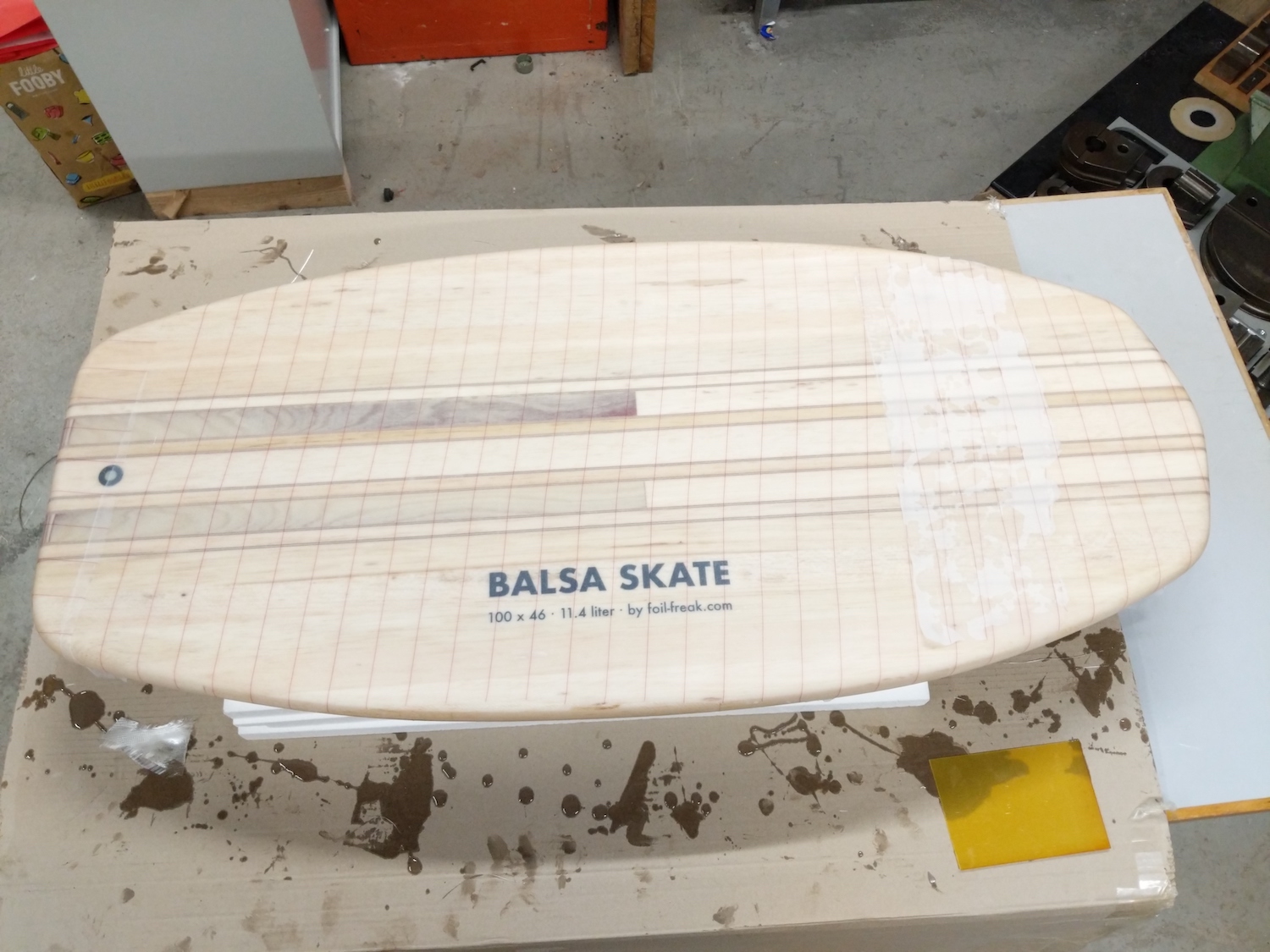 Laminating the board using two fiberglass fabrics, Sicomin Surfclear EVO and peel ply